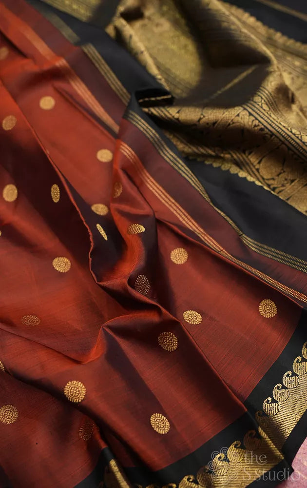 Rust kanjivaram silk saree with black border