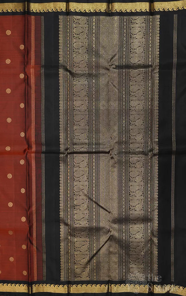 Rust kanjivaram silk saree with black border
