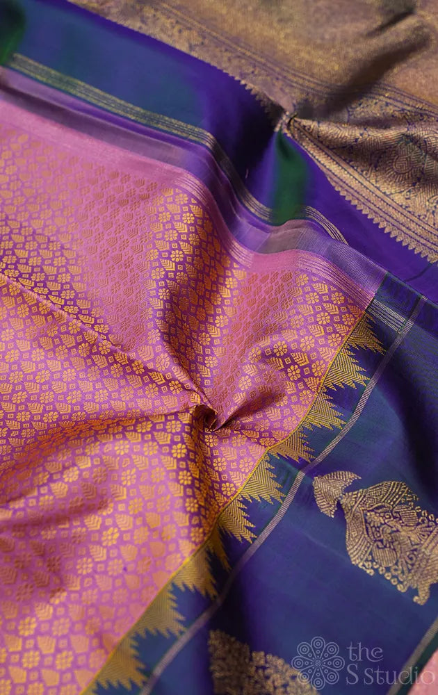 Mauve colour thread woven kanchi silk saree with peacock blue butta woven border