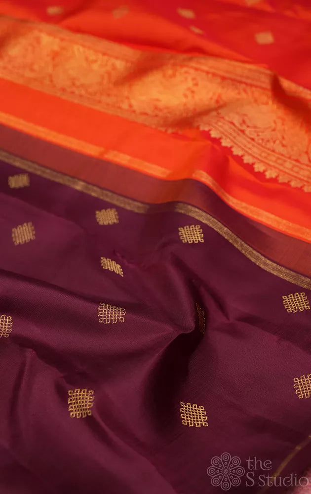 Brown kolam butta kanjivaram saree with orange pallu and blouse