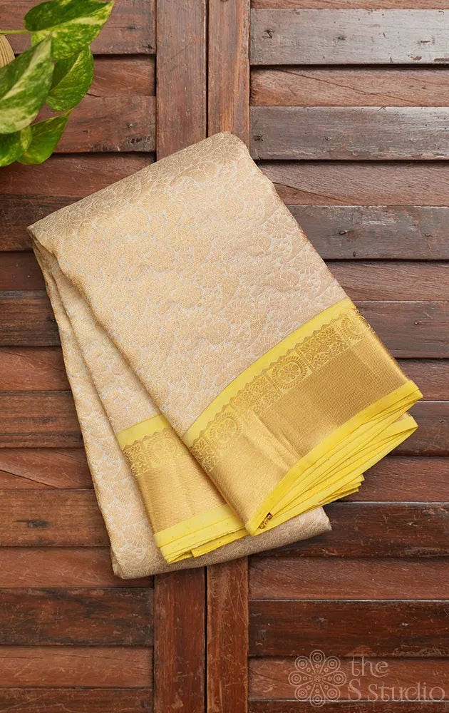 Off white soft silk saree with yellow zari border