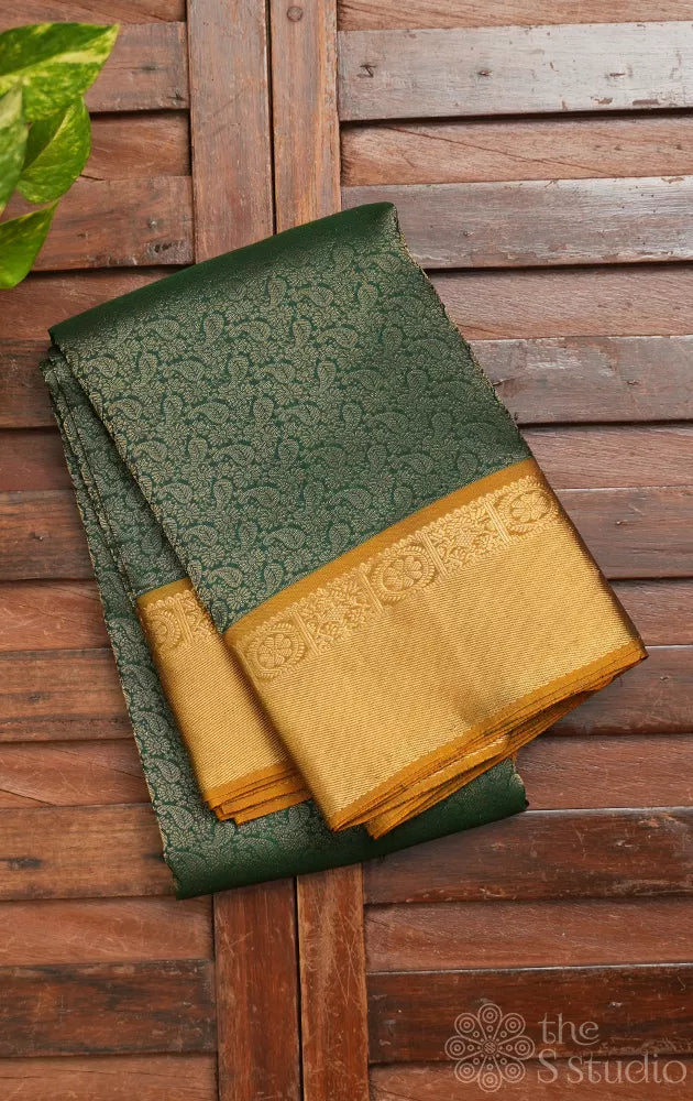 Green soft silk saree with mustard zari border