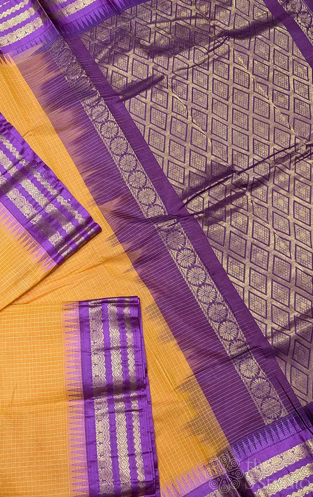 Light orange checked gadwal cotton saree with purple varisaipet border