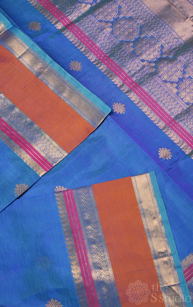 Peacock blue silk cotton saree with zari kolam butta