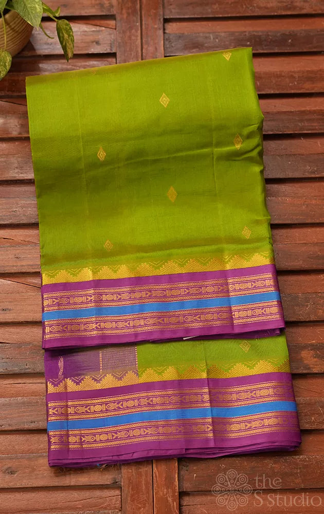 Light green silk cotton saree with korvai border