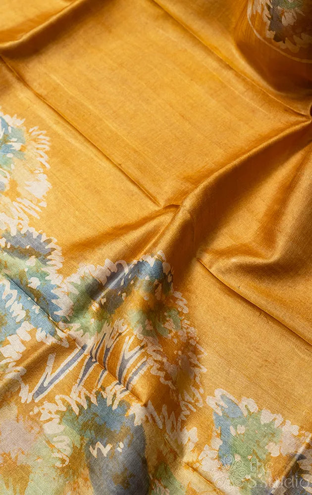 Mustard tussar silk saree with batik prints