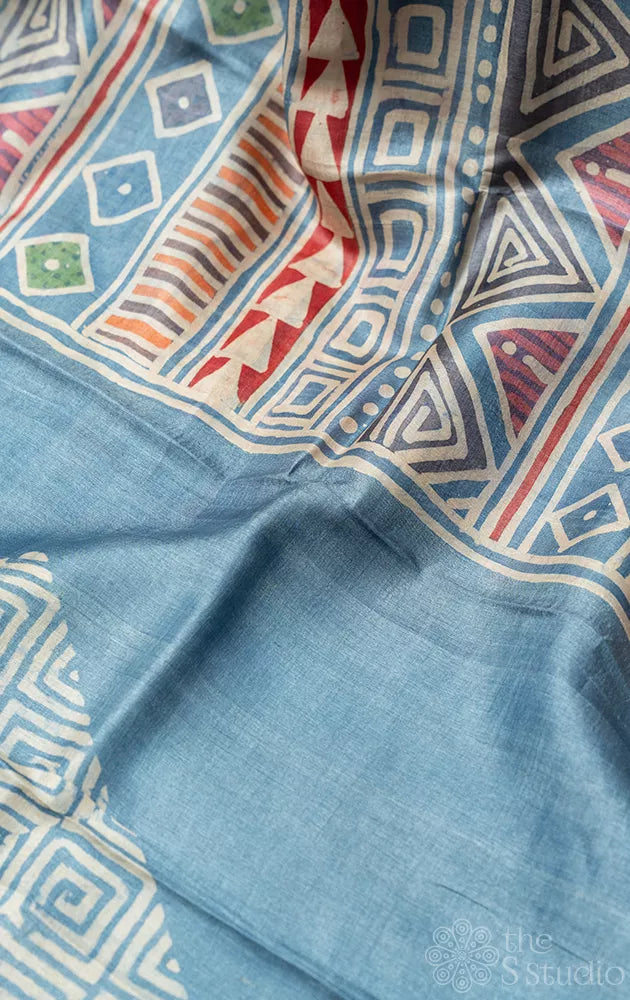 Powder blue tussar silk saree with geometrical batik prints
