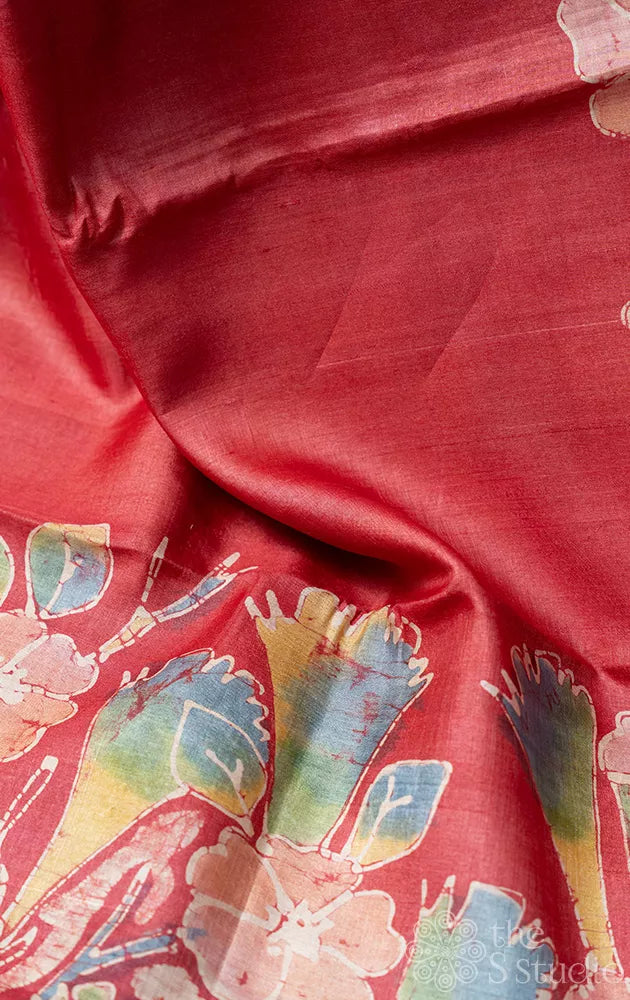 Tomato red tussar silk saree with batik prints