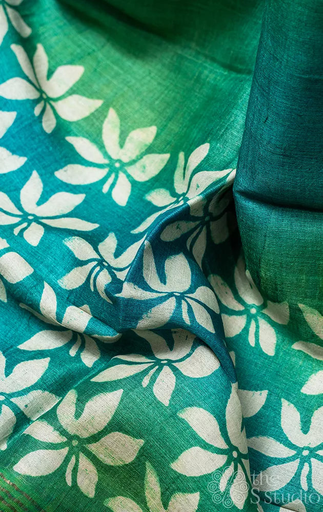 Sea green tussar silk saree with white floral prints