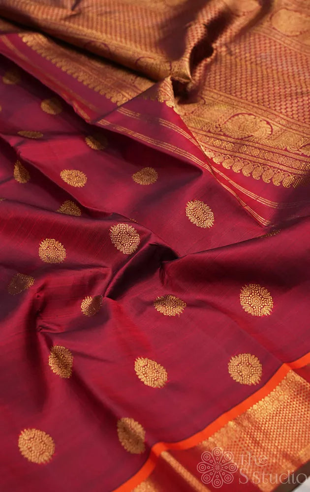 Maroon kanjivaram silk saree with buttas