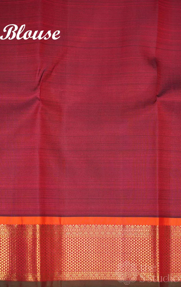 Maroon kanjivaram silk saree with buttas