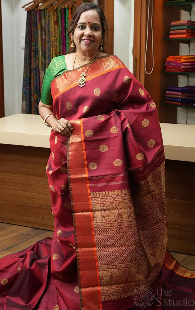 Maroon kanjivaram silk saree with buttas