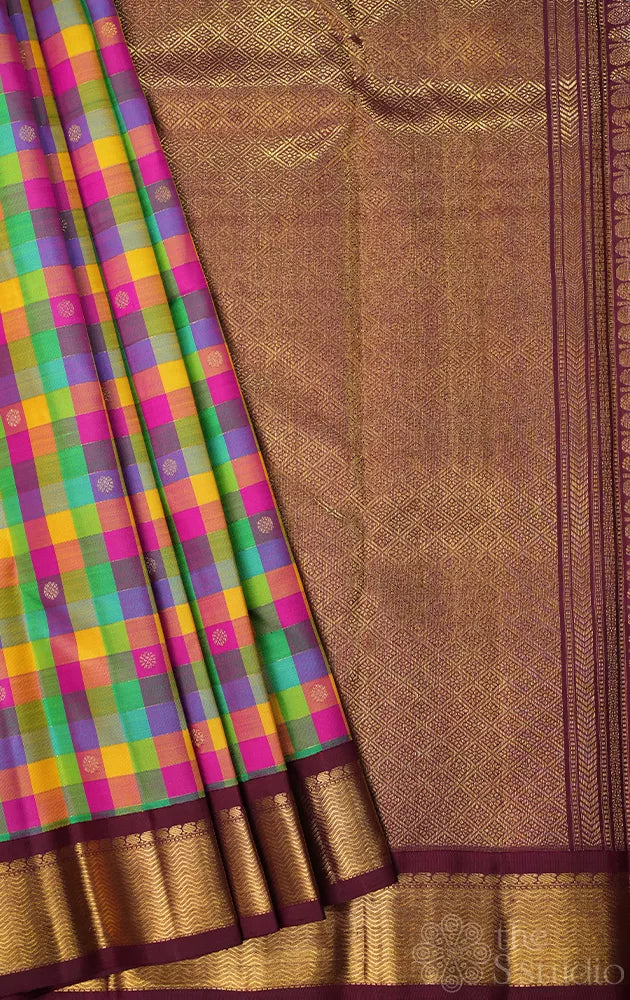 Multicolour checks kanchipuram silk saree with korvai brown border
