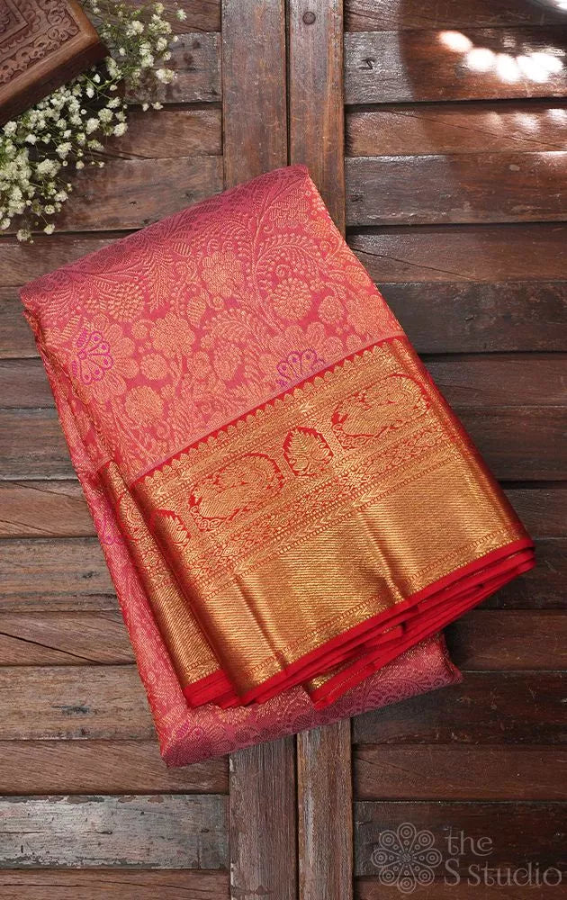 Peach bridal kanchi silk saree with jacquard weaving and red border