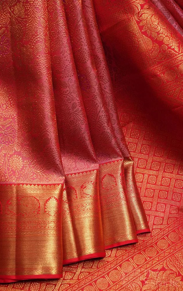 Peach bridal kanchi silk saree with jacquard weaving and red border
