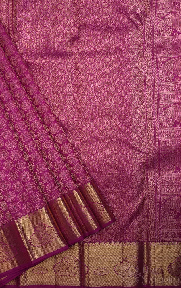 Vadamalli kanchi silk saree with all over designs and zari rich border