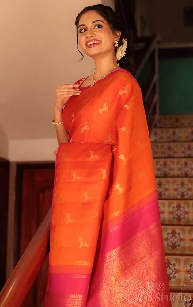 Orange deer butta kanjivaram silk saree with rani pink pallu