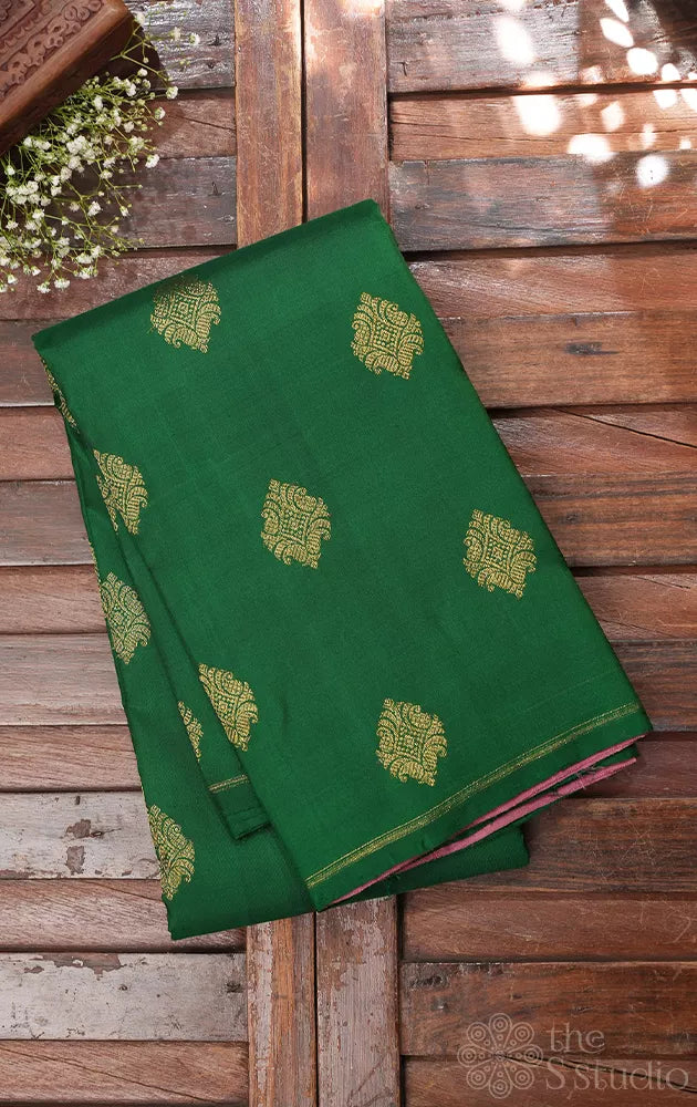 Green borderless kanjivaram silk saree with onion pink pallu