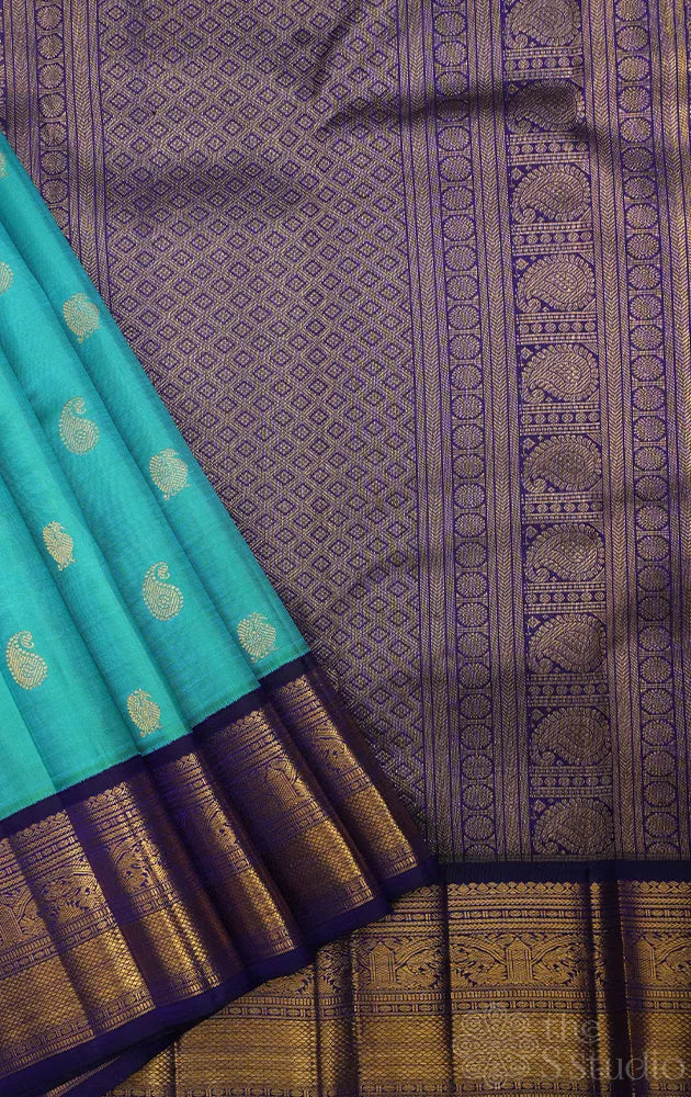 Sea green kanchi silk saree with korvai navy blue border