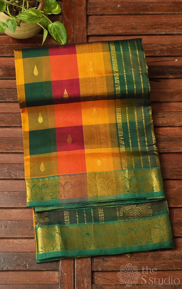Paalum pazhamum checked ten yards silk cotton saree with green pallu