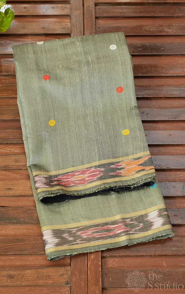 Grey raw silk saree with ikkat border and dolabedi temple design pallu