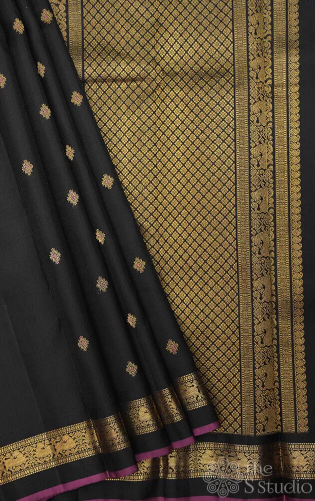 Black kanjivaram silk saree with meenakari butta with dark rani pink selvedge
