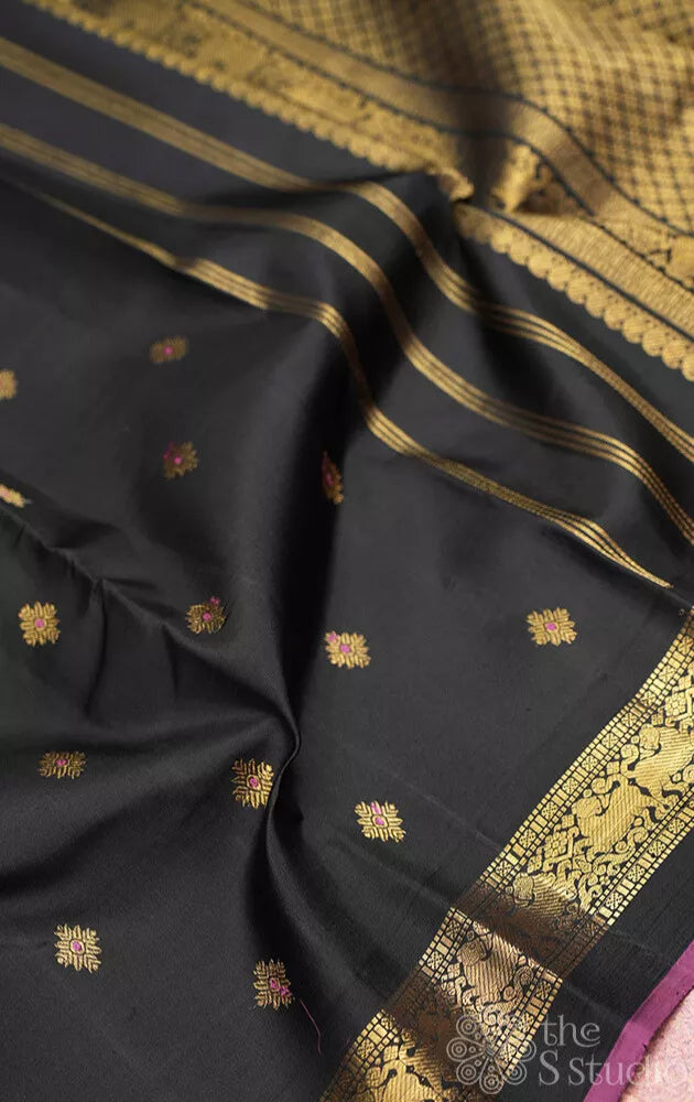 Black kanjivaram silk saree with meenakari butta with dark rani pink selvedge