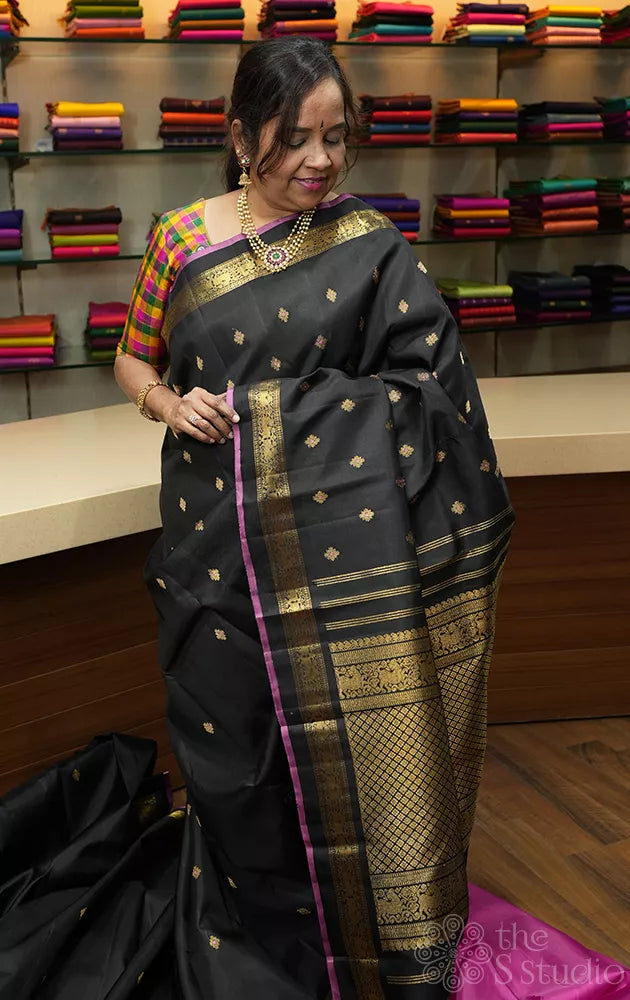 Black kanjivaram silk saree with meenakari butta with dark rani pink selvedge