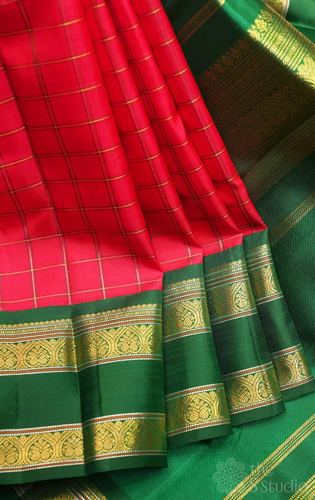 Red checked kanchi pattu saree with green rettaipet border