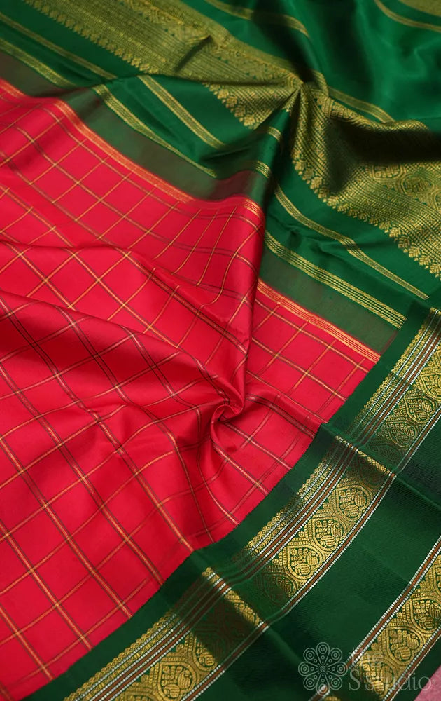 Red checked kanchi pattu saree with green rettaipet border