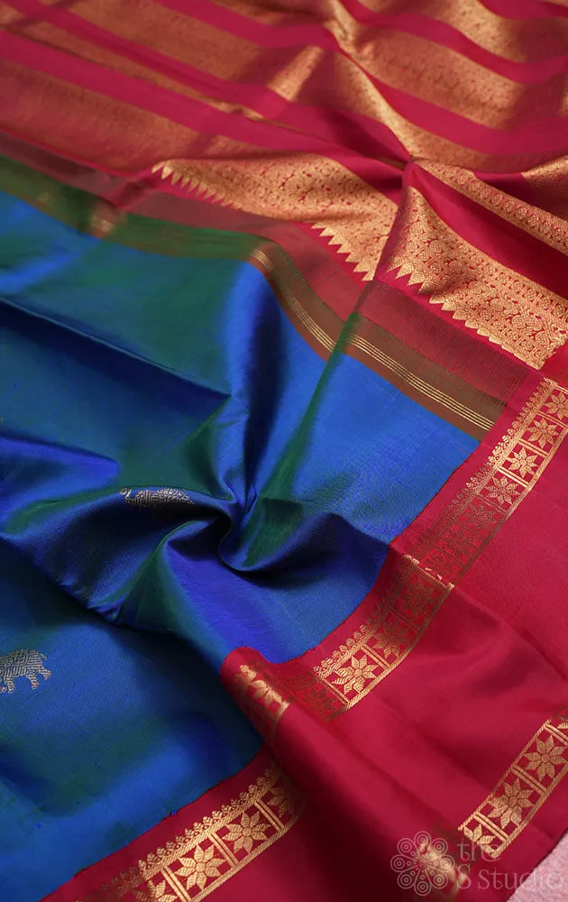Peacock blue kanchipuram silk saree with korvai rettaipet border