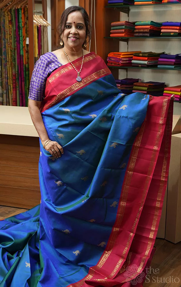 Peacock blue kanchipuram silk saree with korvai rettaipet border
