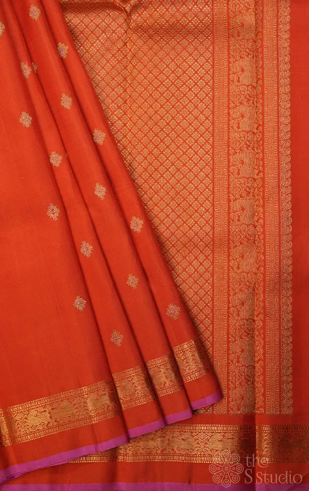 Orange kanchipuram silk saree with meena buttas