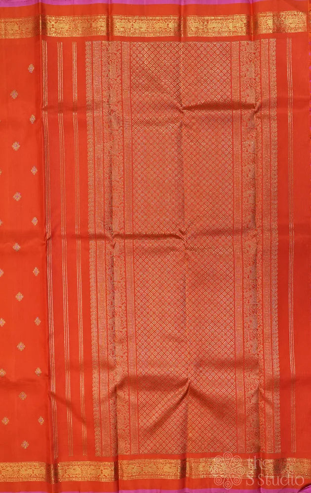 Orange kanchipuram silk saree with meena buttas