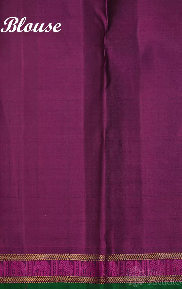 Royal blue kanjivaram silk saree with small magenta border