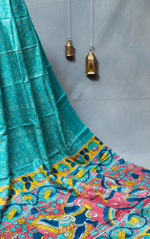 Sea green tussar silk saree with bandhini prints and kalamkari pallu