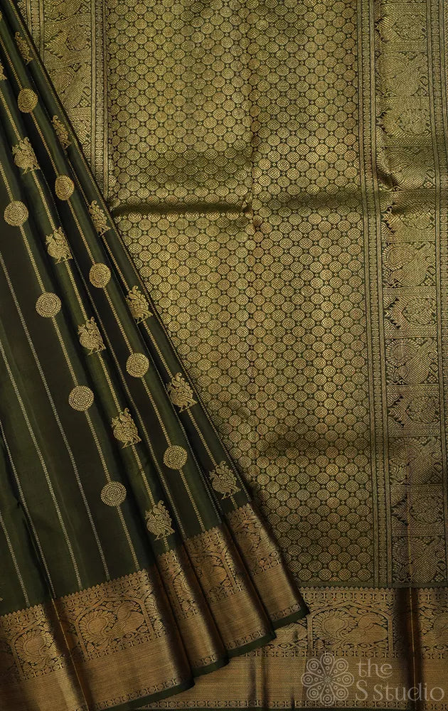 Mehandi green kanchi pattu saree with vertical vangi designs