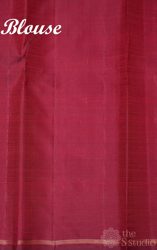 Maroon kanchi silk saree with mango motifs along the border