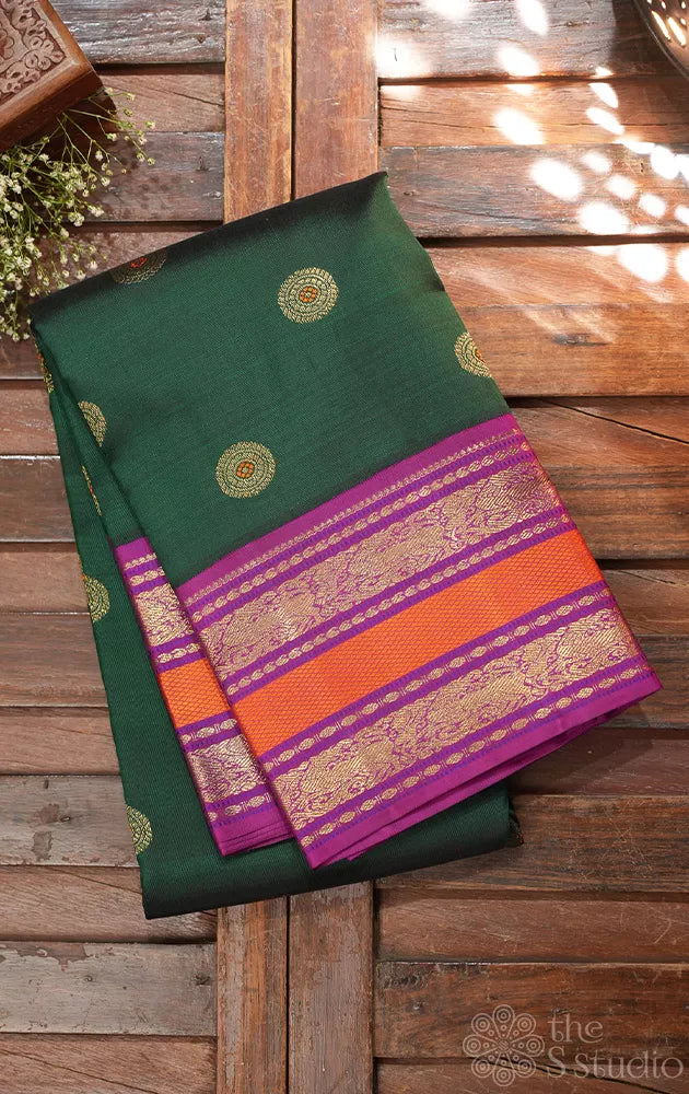 Green korvai kanchipuram silk saree with purple border