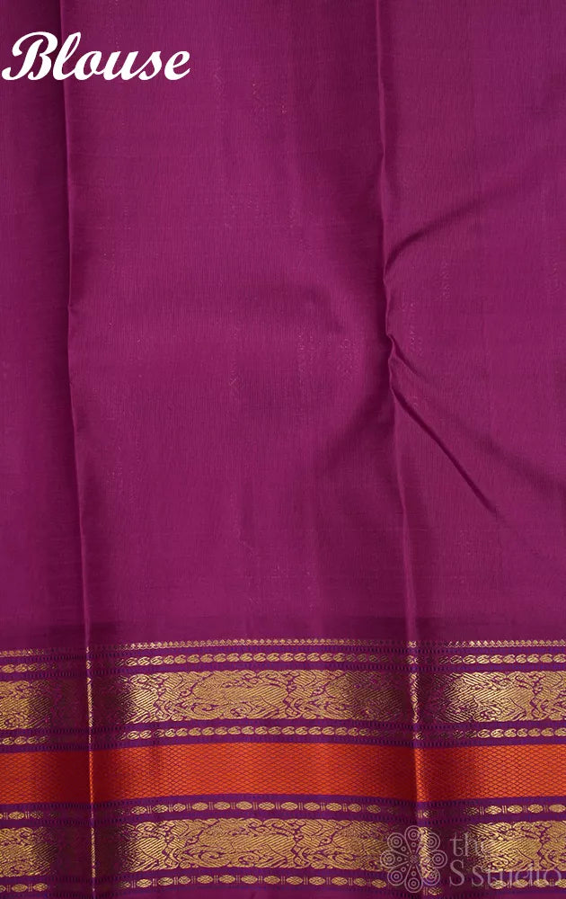 Green korvai kanchipuram silk saree with purple border