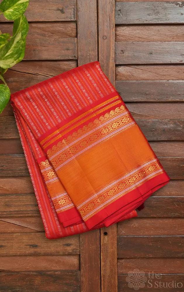 Red kanjivaram saree with thread woven body and a zari rich border