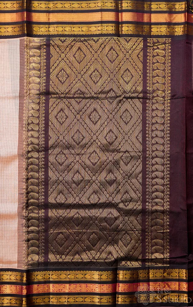 Light brown checked handloom silk cotton saree with korvai border