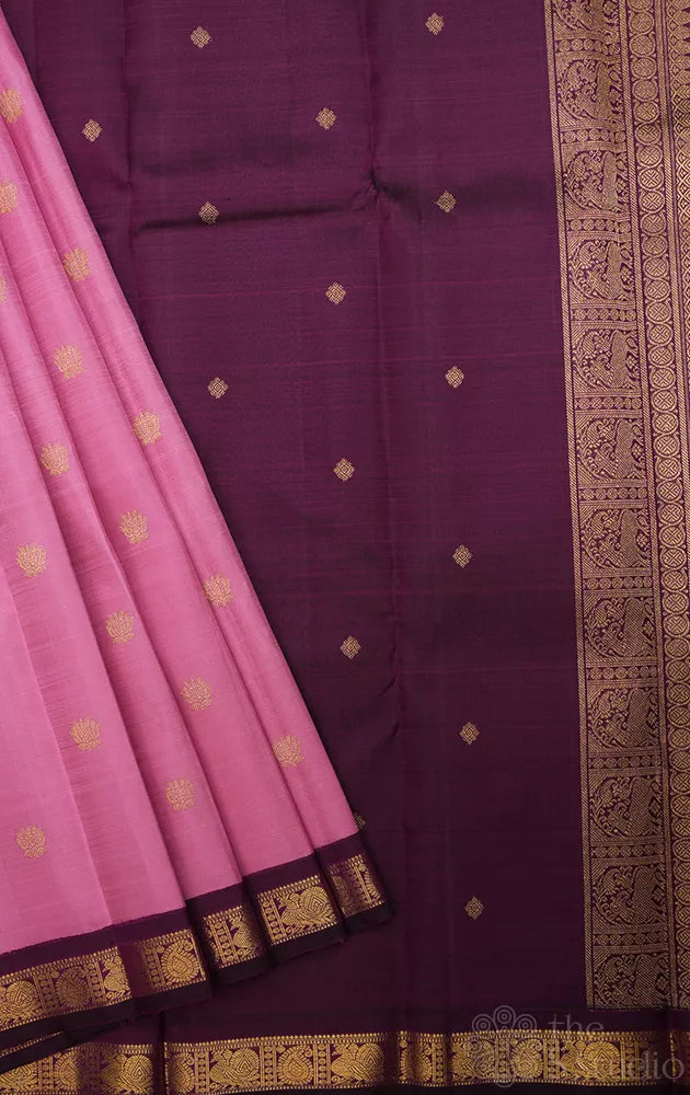 Onion pink kanchi silk saree with small korvai purple border