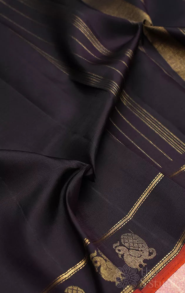 Dark brown adai woven kanjeevaram silk saree with annam motifs