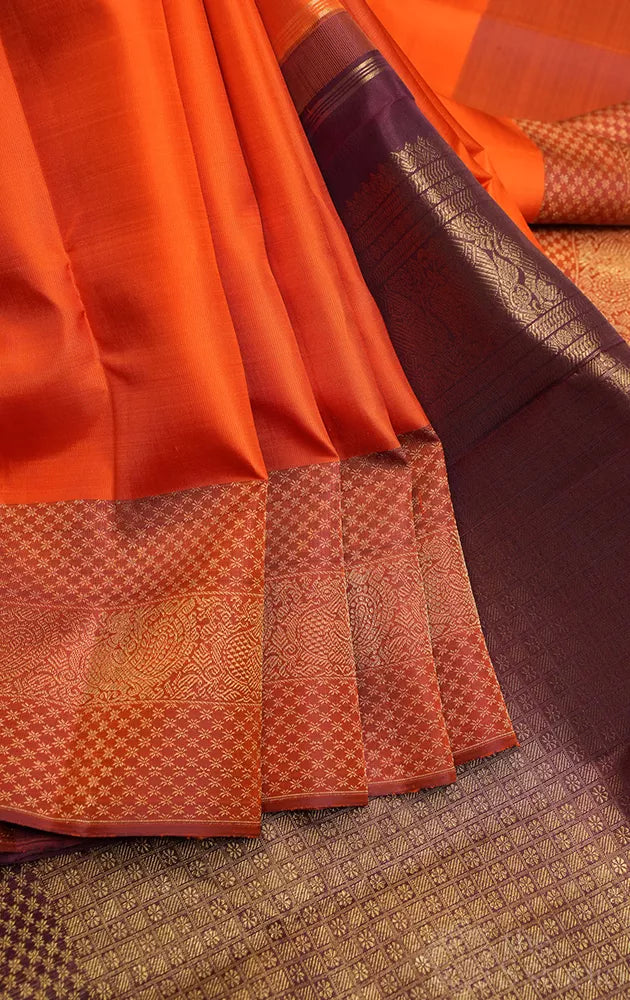 Burnt Orange kanchipuram silk saree with maroon border