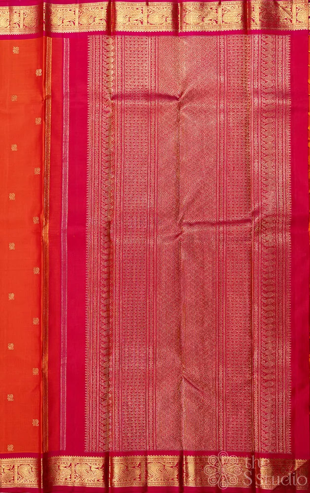 Orange kanjivaram silk saree with small rani pink border