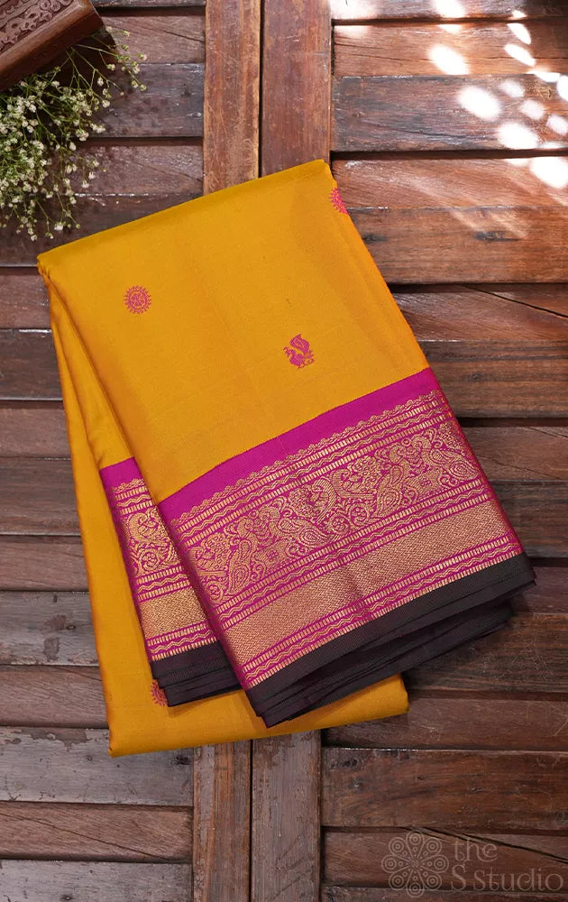Mustard kanchipuram silk saree with korvai ranipink border