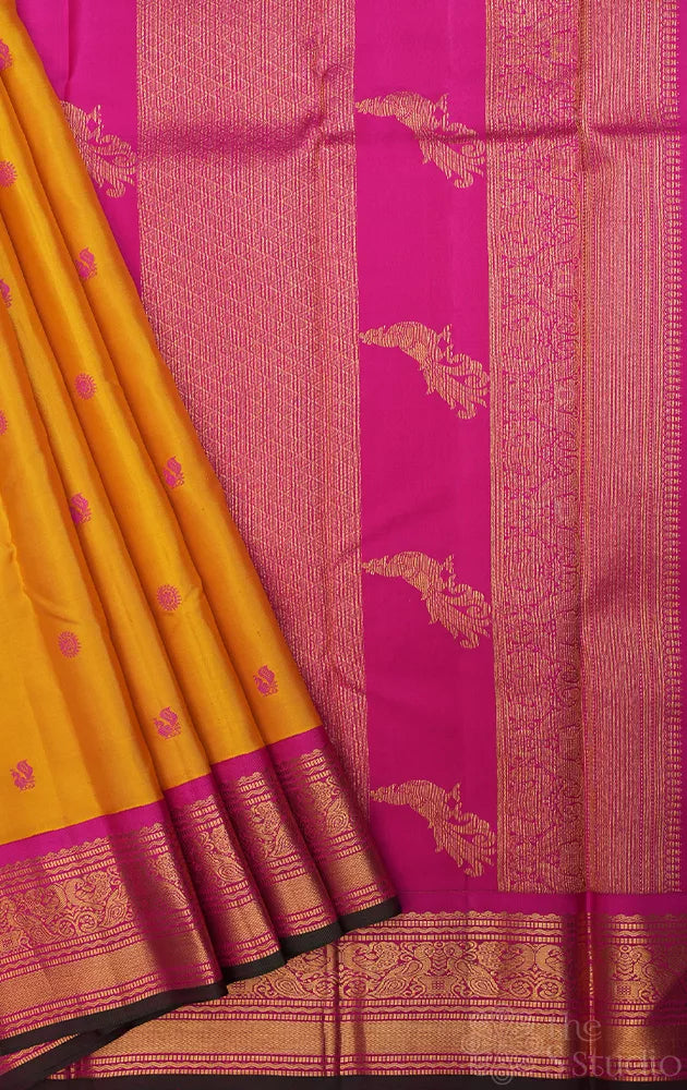 Mustard kanchipuram silk saree with korvai ranipink border