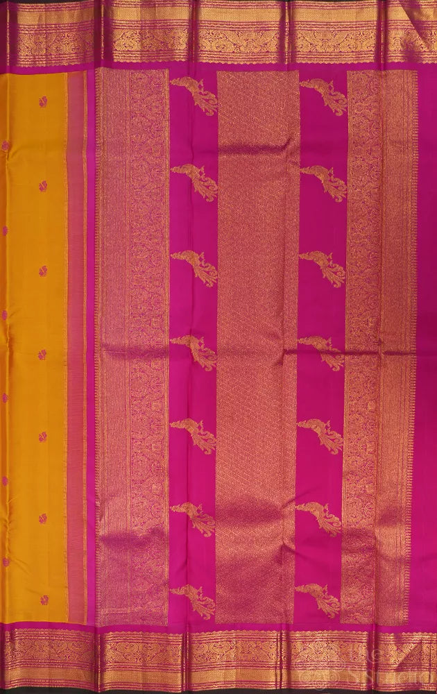 Mustard kanchipuram silk saree with korvai ranipink border