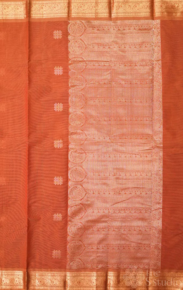 Rust handloom kanchi cotton saree with zari woven border